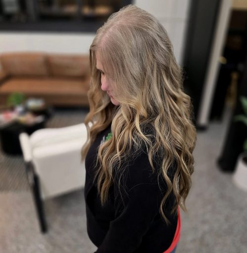 Cool blonde extension length, seen from the side